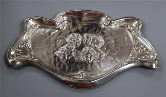 An Art Nouveau Edwardian repousse silver dressing table tray, Samuel M. Levi, Birmingham, 1909, 7.5 oz.